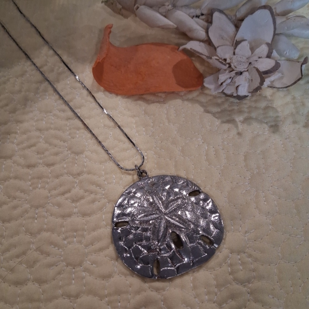 Elegant Silver Sand Dollar Necklace